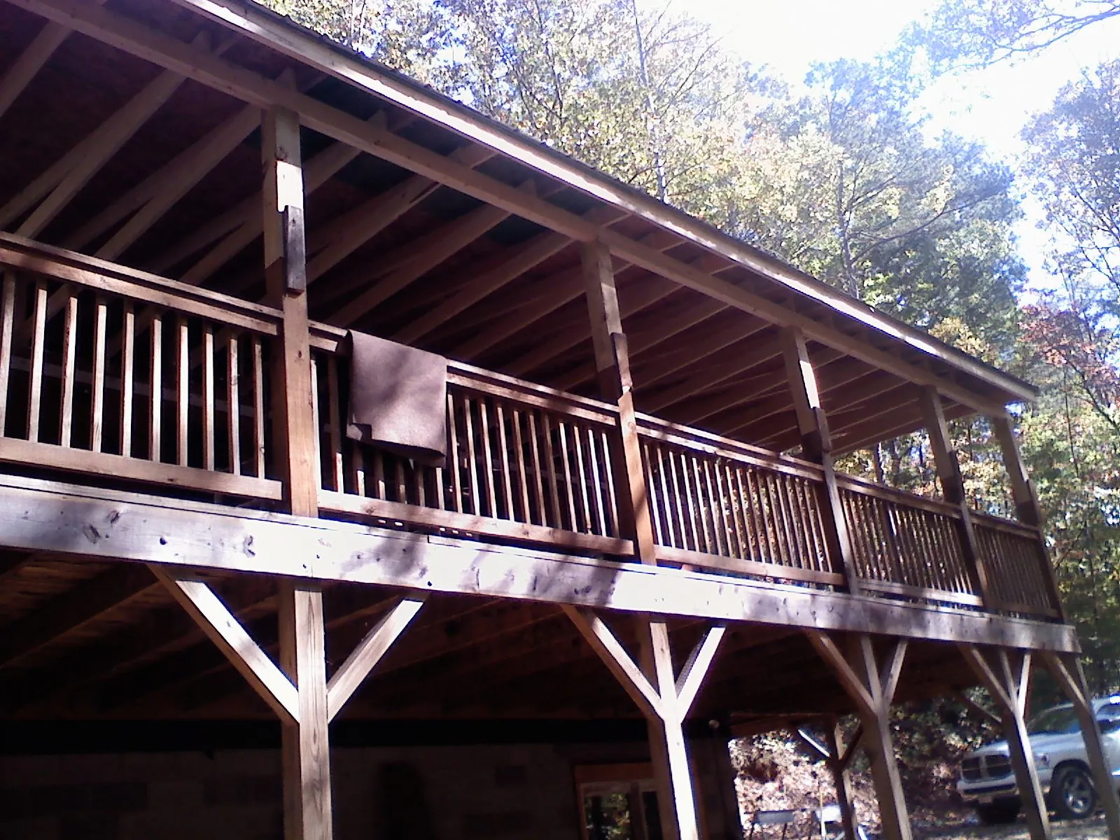 Timber framing under a new elevated porch and deck — Roof Leak Repair in Putney by Roofing Brothers